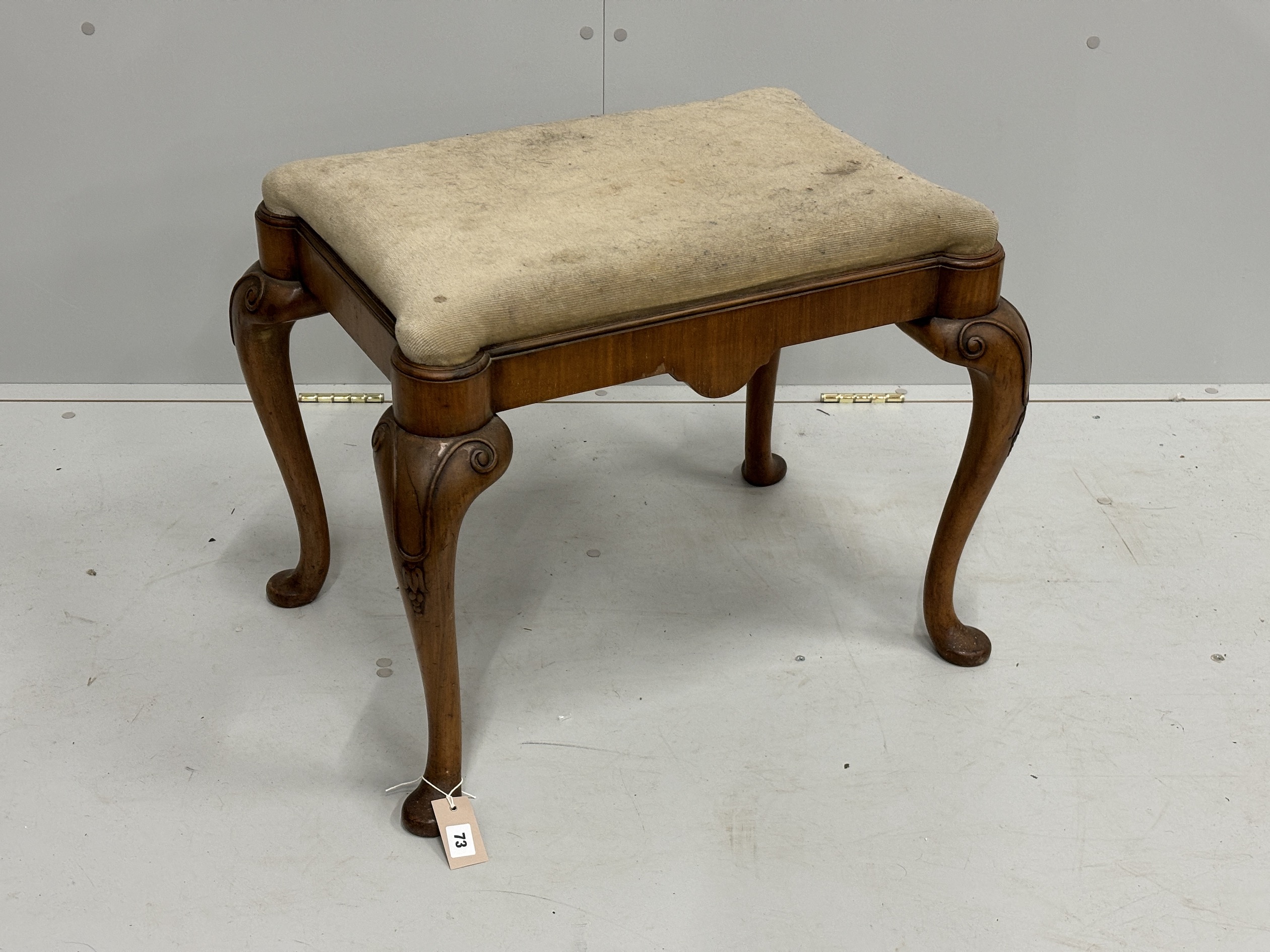 A Queen Anne Revival walnut dressing stool, width 64cm, depth 48cm, height 51cm